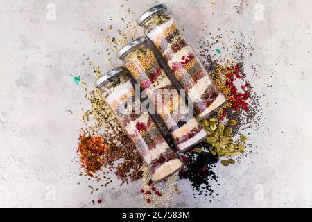 Various spices in glass bottles as ingredient for healthy food Stock Photo
