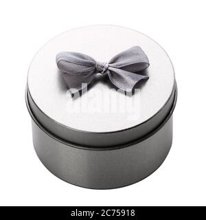 Round metal gift box on a white background. Stock Photo