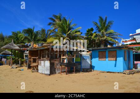 Rustic beach shacks on Ngor island, Senegal Stock Photo