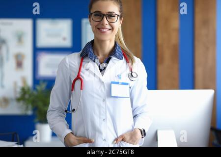Lovely specialist with name tag Stock Photo