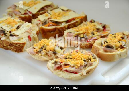 Toast with cheese, mayo and tomatoes sauce. Stock Photo