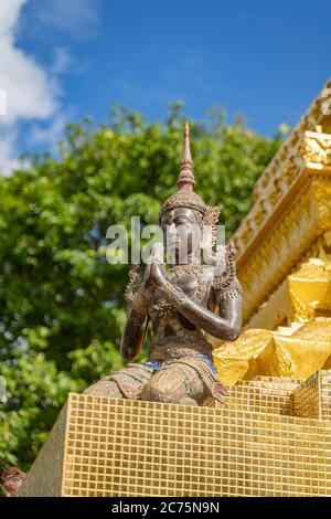 Traditional figure of deva (Angel) , clasping hand , in Thai style at ...