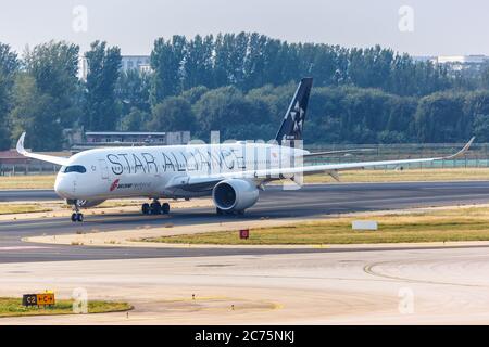 Beijing, China - October 1, 2019: Air China Airbus A350-900 airplane Star Alliance special livery at Beijing Capital Airport (PEK) in China. Airbus is Stock Photo