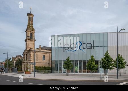 Irvine, Scotland, UK - July 12, 2020: Looking down High Street Irvine to the new Build Portal Centre and the Irvine Town Hall close behind. Stock Photo