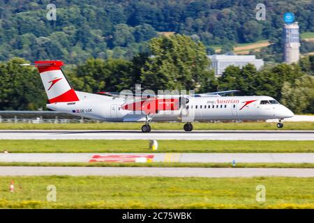 Stuttgart, Germany - July 9, 2020: Austrian Airlines Bombardier DHC-8-400 airplane at Stuttgart Airport (STR) in Germany. Stock Photo
