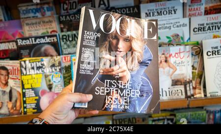 San Francisco, USA - August 2019: Hand holding a copy of Vogue magazine with Taylor Swift on cover Stock Photo