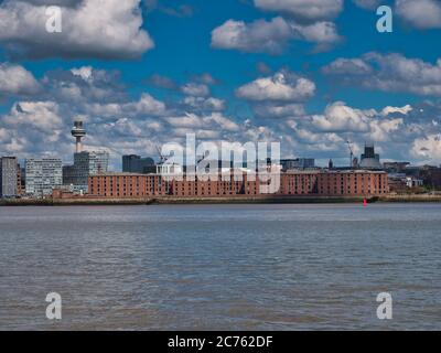 The front of the Albert Dock warehouse buildings on the historic Liverpool waterfront on the River Mersey, UK Stock Photo