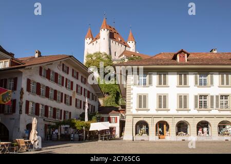 Main square in Thun old city, castle on the hill, facades of buildings. Switzerland. Stock Photo