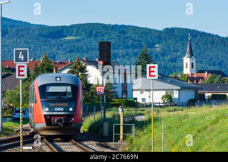 Lanzenkirchen: local train to Wiener Neustadt, church Lanzenkirchen in Wiener Alpen, Alps, Niederösterreich, Lower Austria, Austria Stock Photo