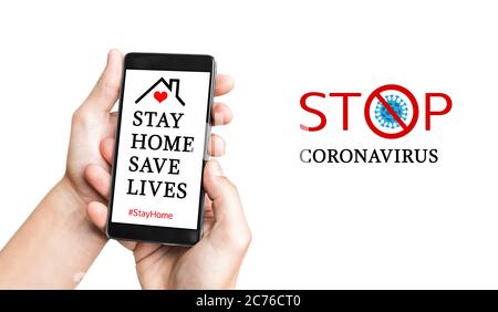 Man hand with mobile smartphone with Stay Home challenge. Stay home during the coronavirus pandemic. Stay at home advice to stop coronavirus COVID-19 Stock Photo