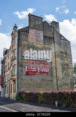 1940s Coca Cola Ghost Sign on gable end of tenement building in Glasgow Scotland Stock Photo