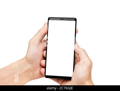 Close up of man's hands holding mobile smart phone with blank copy space screen, isolated on white background. Image of man using his mobile phone. Stock Photo