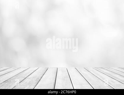Perspective empty wooden table over blurred store with bokeh light background. Product display template. Stock Photo