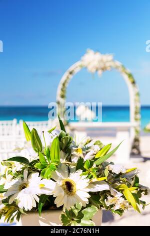 Romantic Wedding Bouquet on Sandy Tropical Caribbean Beach In in Punta Cana, Dominican Republic Stock Photo