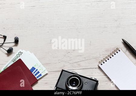 Set of travel stuff on old wooden background Stock Photo