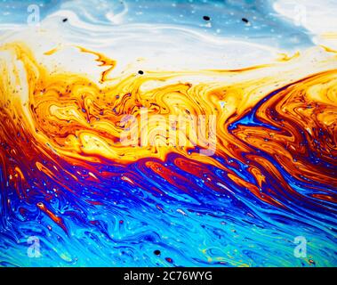 Coloful rainbow psychedelic abstract patternt on soap bubble surface. Macro shot for design Stock Photo