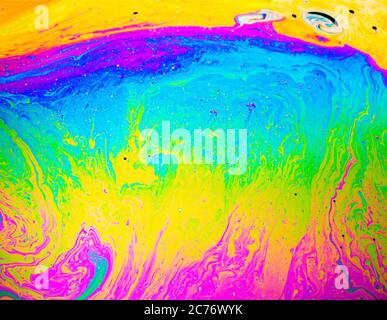 Coloful rainbow psychedelic abstract patternt on soap bubble surface. Macro shot for design Stock Photo