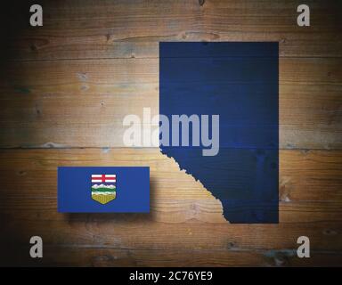 Map and flag of ALBERTA, province of Canada, on wooden background, 3D illustration Stock Photo