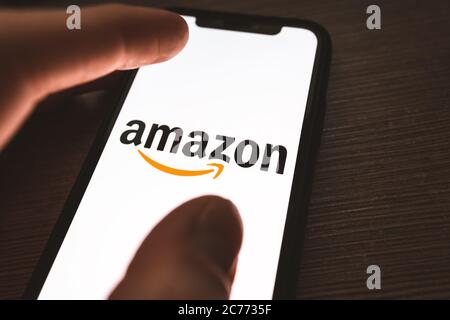 AWS logo on the smartphone screen.  Stock Photo