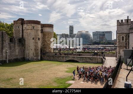 A crowd of visitors outside the entrance to the Tower of London, UK Stock Photo