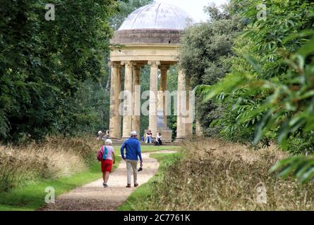 Visitors approach the Statue of Venus, in the Rotunda at Stowe Landscape Gardens, Stowe House, Buckinghamshire, England, UK on Tuesday July 14th 2020 Stock Photo