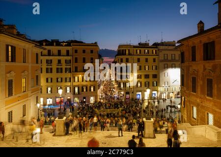 Sunset at Via dei Condotti crowded with tourists, Spanish Steps, Piazza di Spagna, Rome, Italy Stock Photo