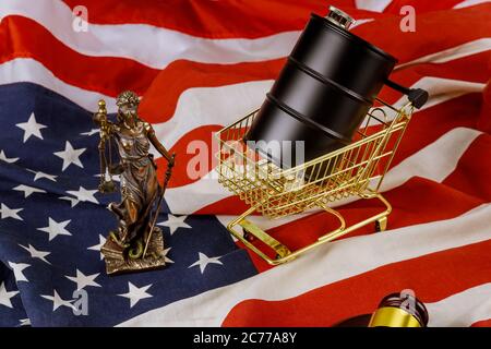 Concept on of petroleum products price growth of US paper currency USA flag wooden judge hammer court showdowns Stock Photo