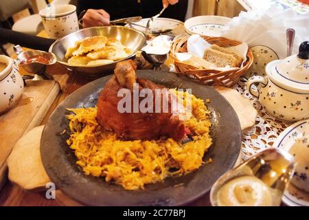 Traditional polish food pork knuckle roast and local cuisine set serve with seasoning side dish in restaurant for pole people and foreign traveler eat Stock Photo