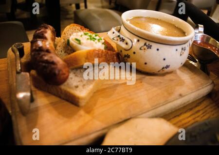 Traditional polish food breakfast and local cuisine set serve with soup bread and side dish in restaurant for pole people and foreign traveler eat dri Stock Photo