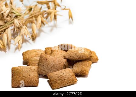 Dietary cereal pads on a white background. Dietary cereal pads isolated on white background, place for text. Stock Photo