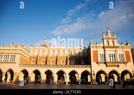 Polish or Pole people and foreigner travelers travel visit and shopping at Sigismund Column and Cloth Hall in Krakow Old Town Main Square at Stare Mia Stock Photo