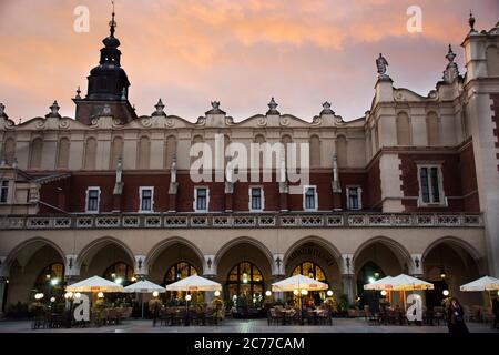 Polish or Pole people and foreigner travelers travel visit and shopping at Sigismund Column and Cloth Hall in Krakow Old Town Main Square at Stare Mia Stock Photo