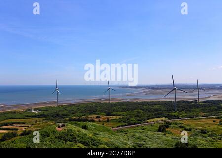 Coastal and Offshore Windmill farm near Miaoli County, Houlong Township Taiwan Stock Photo