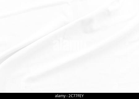 Soft white fabric texture background. Abstract cloth with soft waves for  wallpaper or backdrop Stock Photo