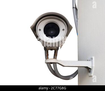 CCTV camera on wall isolated on white background. Stock Photo