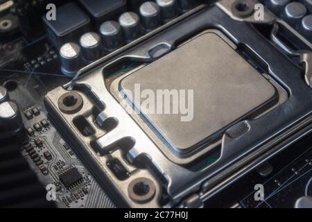 Close up cpu socket on motherboard Computer PC with cpu processor Stock Photo