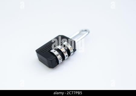black combination lock for a suitcase on white Stock Photo