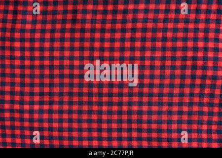 Blue with red checkered seamless fabric. Textural background Stock Photo