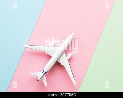 Model plane,airplane on pastel colorful background.Flat lay design. Stock Photo