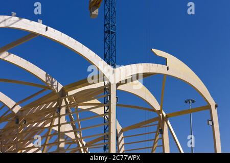 Wooden shipyard under construction near a crane (Pesaro, Italy, Europe) Stock Photo