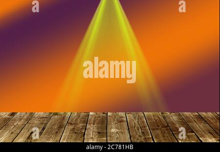 a beam of reflector on a wooden stage an orange red background Stock Photo