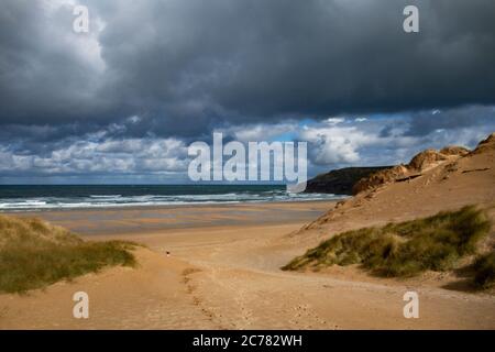 stormy sky over holywell bay near newquay in cornwall, england. Stock Photo