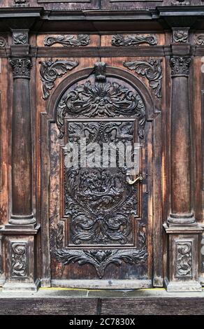 Poland, Wroclaw city,province of Lower Silesia,    Detail of the carved wooden entrance door to the Cathedral of St. John the Baptist in the city of Wroc&#x142,aw Stock Photo