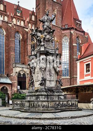 Poland, Wroclaw city,province of Lower Silesia, Statue of St. John Nepomunk created by Jan Ji&#x159,i Urbansky in 1732 opposite the Collegiate Church of the Holy Cross and St. Bartholomew on Cathedral Island. Stock Photo