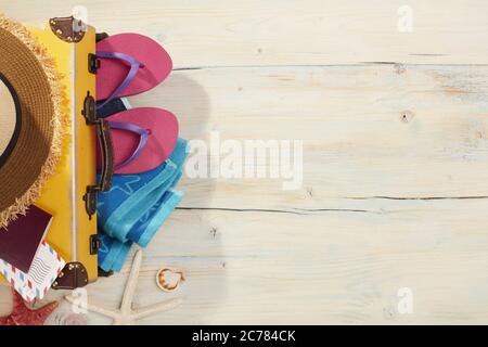 Beach items on a wooden background Stock Photo