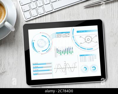 Graphs and charts on digital tablet Stock Photo