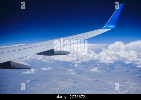 Plane horizon aerial view. Airplane wing sky view Stock Photo