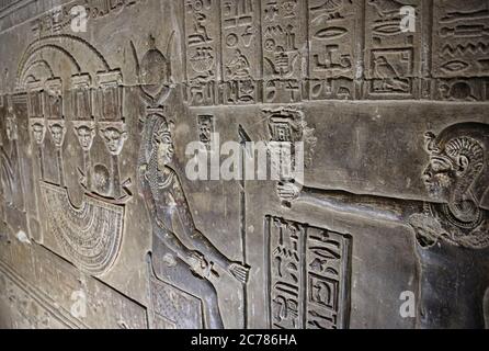 Mysterious murals on the walls of the Temple of Dendera Hathor , near the city of Ken. Stock Photo