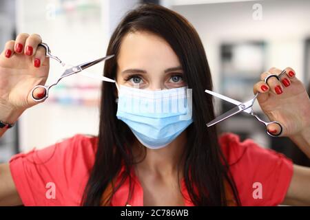Dark haired lady indoors Stock Photo