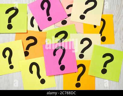 Question marks on adhesive notes Stock Photo